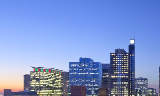 Illuminated buildings and sunset